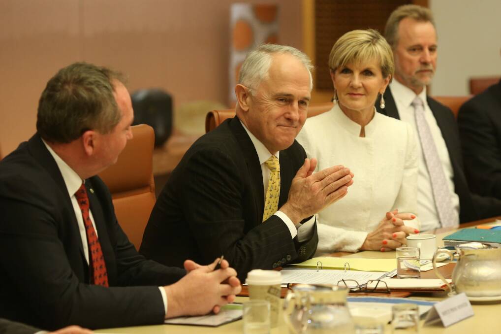 Malcolm Turnbull with Deputy Prime Minister Barnaby Joyce and Foreign Affairs Minister Julie Bishop in his first post-election cabinet meeting. Photo: Andrew Meares