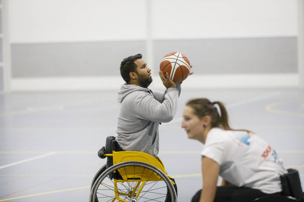 Canberra Chargers wheelchair basketball players at training on Monday night.