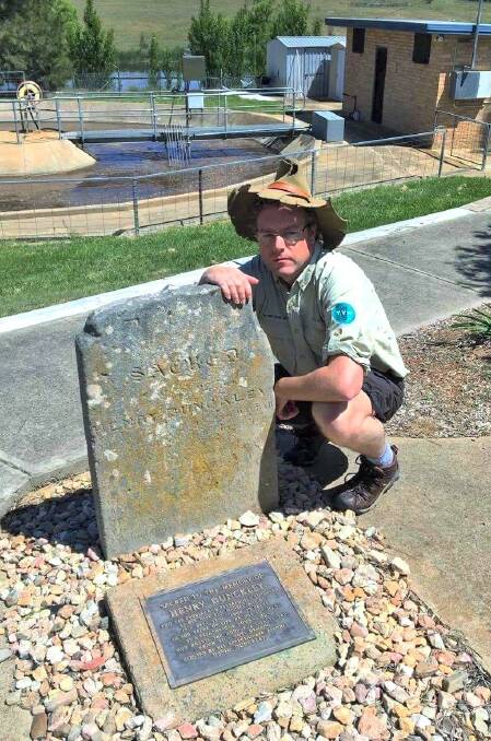 Tim at Henry Dunkley’s grave in the Gunning Sewerage Works. Photo: Gary Poile