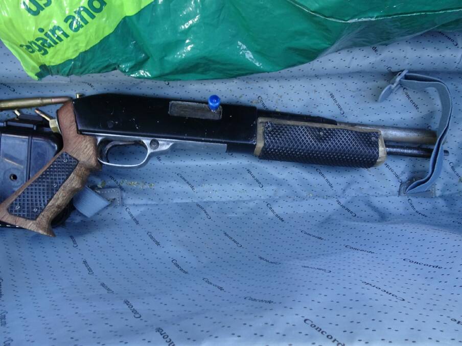 Shotgun seized by police during Saturday's raid on a known bikie associate in Banks. Photo: ACT Policing