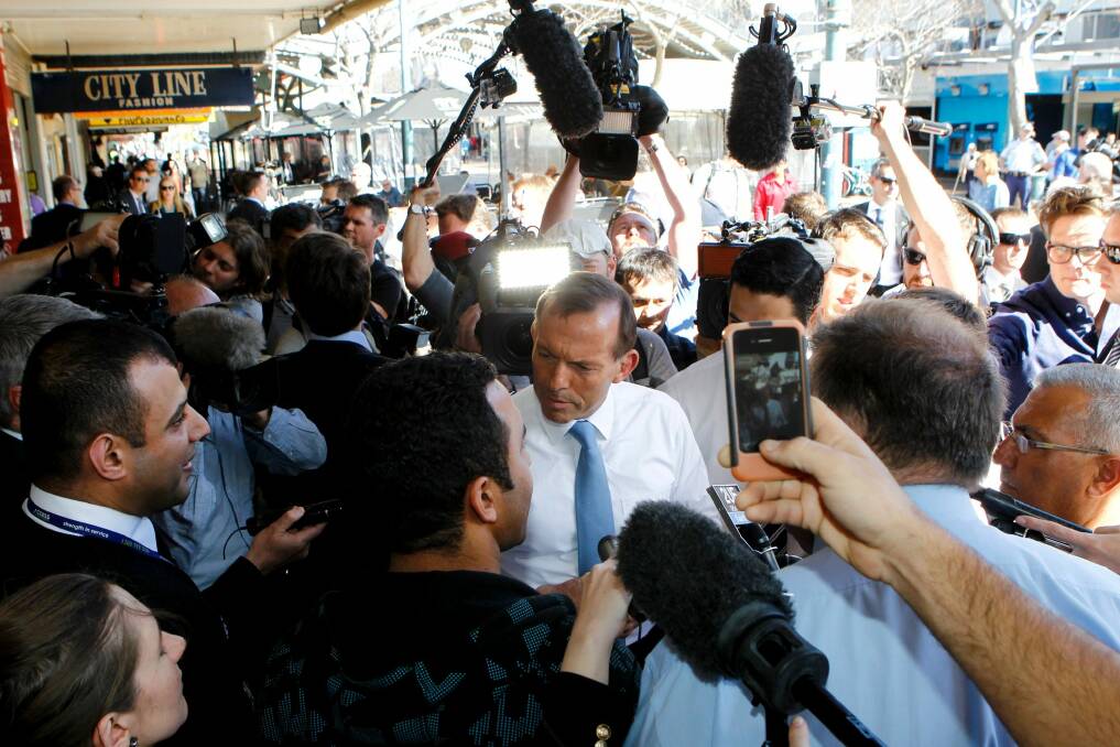 The then opposition leader, Tony Abbott, pledges to fund a CCTV network for Liverpool in Sydney's west during the 2013 election campaign.