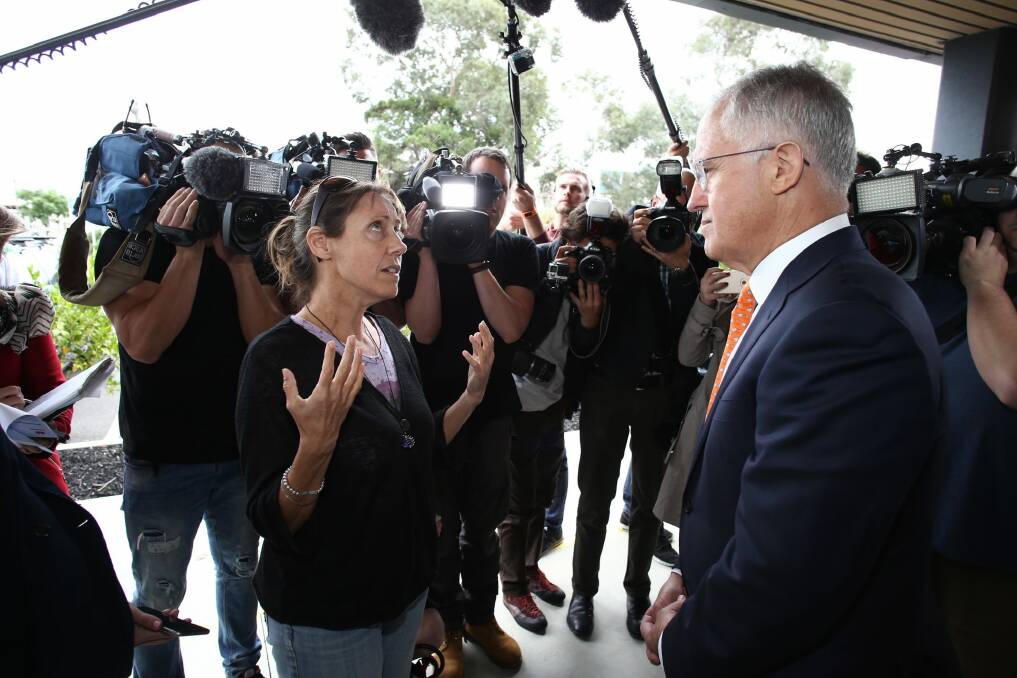 Single mother of two Melinda confronts Prime Minister Malcolm Turnbull. Photo: Andrew Meares