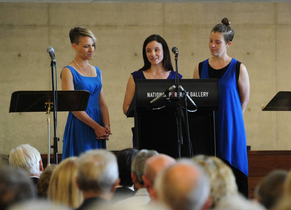 Andrew Sayers' daughters, from left, Hanako Sayers, Ianthe Mills and Ella Sayers share memories of their father at the commemoration concert. Photo: Melissa Adams