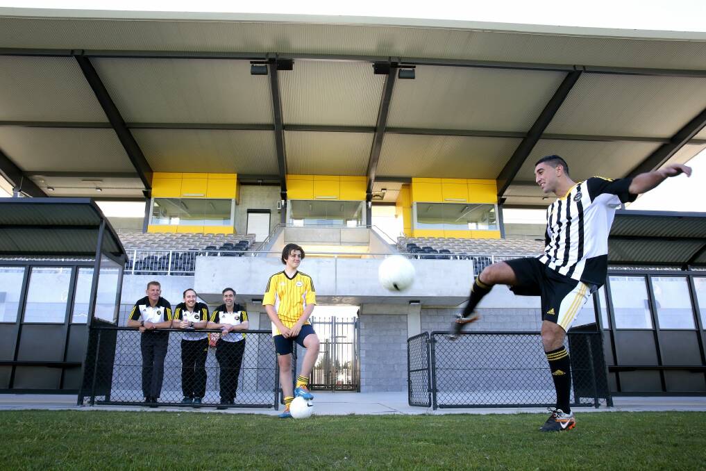 Gungahlin United will play in the men's Capital Football National Premier League next season.  (rear from left), men's head coach Claudio Canosa, assistant head coach Mitch Stevens, president Ricardo Alberto, front from left, under-18 player Frazier Phillips and men's premier league player Stephen Domenici at Gungahlin Enclosed Oval.  Photo: Jeffrey Chan