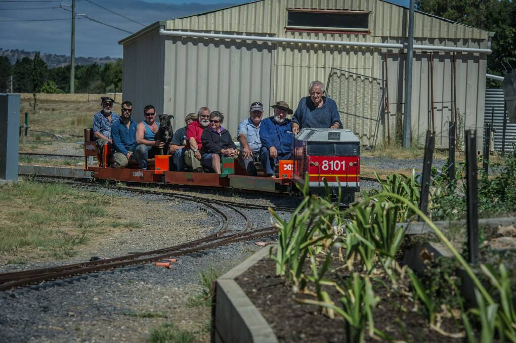 Members of the Canberra Society of Model and Experimental Engineers give the 81 a test run ahead of the weekend. Photo: karleen minney