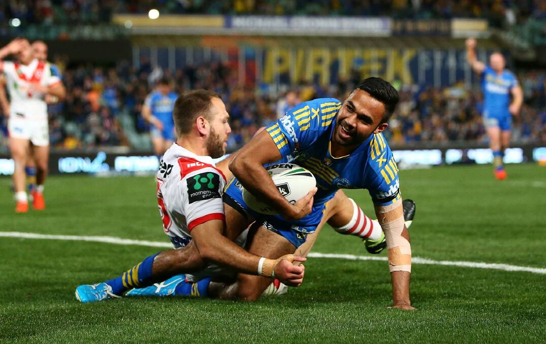 Top talent: Bevan French scores a try during the round 25 NRL match between the Parramatta Eels and the St George Illawarra Dragons at Pirtek Stadium. Photo: Mark Nolan