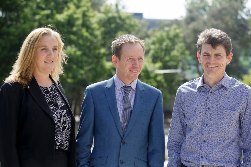 Chair of the Australian photovoltaic institute Renate Egan, ACT minister for climate change and sustainability Shane Rattenbury, and ANU research fellow Dr Matthew Stocks at the launch of a solar potential map. Photo: Sitthixay Ditthavong