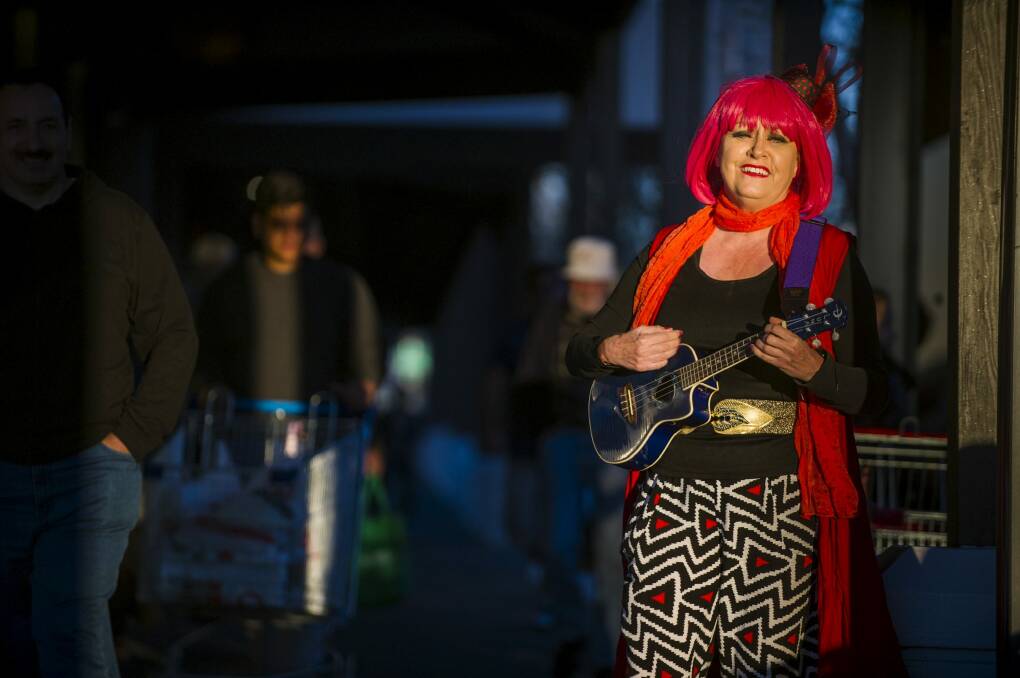 Bernadette Vincent performing in Gungahlin. She says she was harassed by security guards when busking outside of Floriade. Photo: Rohan Thomson
