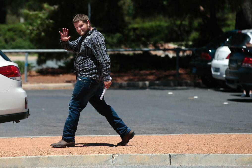 Canberra man Aaron Raymond Dudeck, also known as Aaron Raymond Hudson, leaves ACT Magistrates Court after being granted bail. Photo: Jeffrey Chan