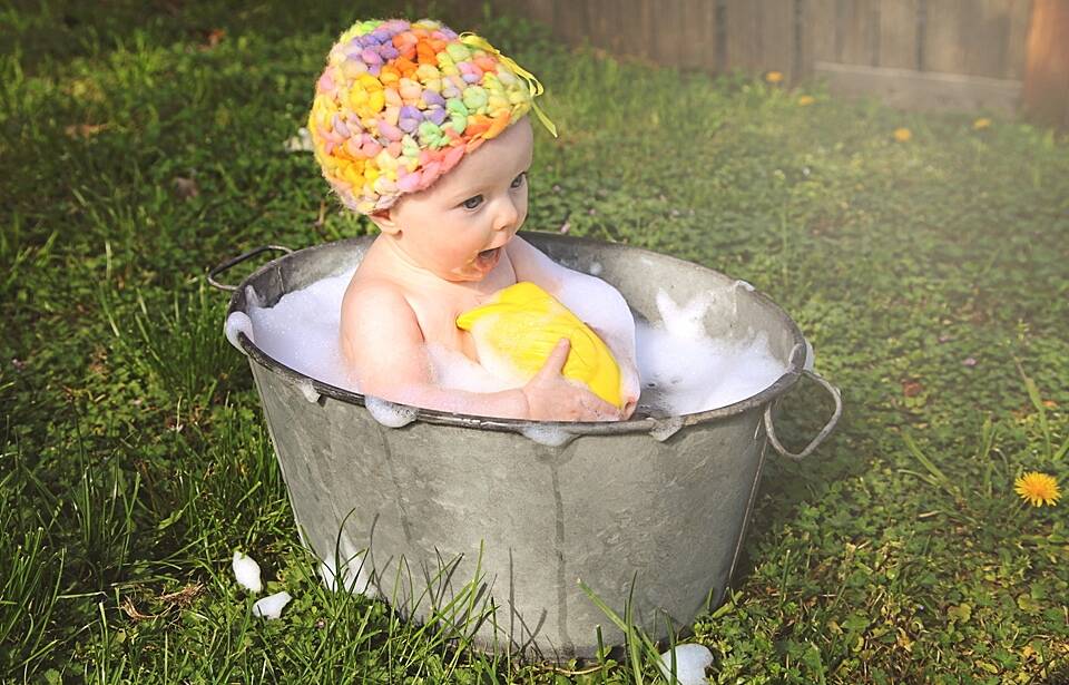 Belinda Garfath's daughter Ava enjoys her first summer outside in the bath.  Photo: Belinda Garfath