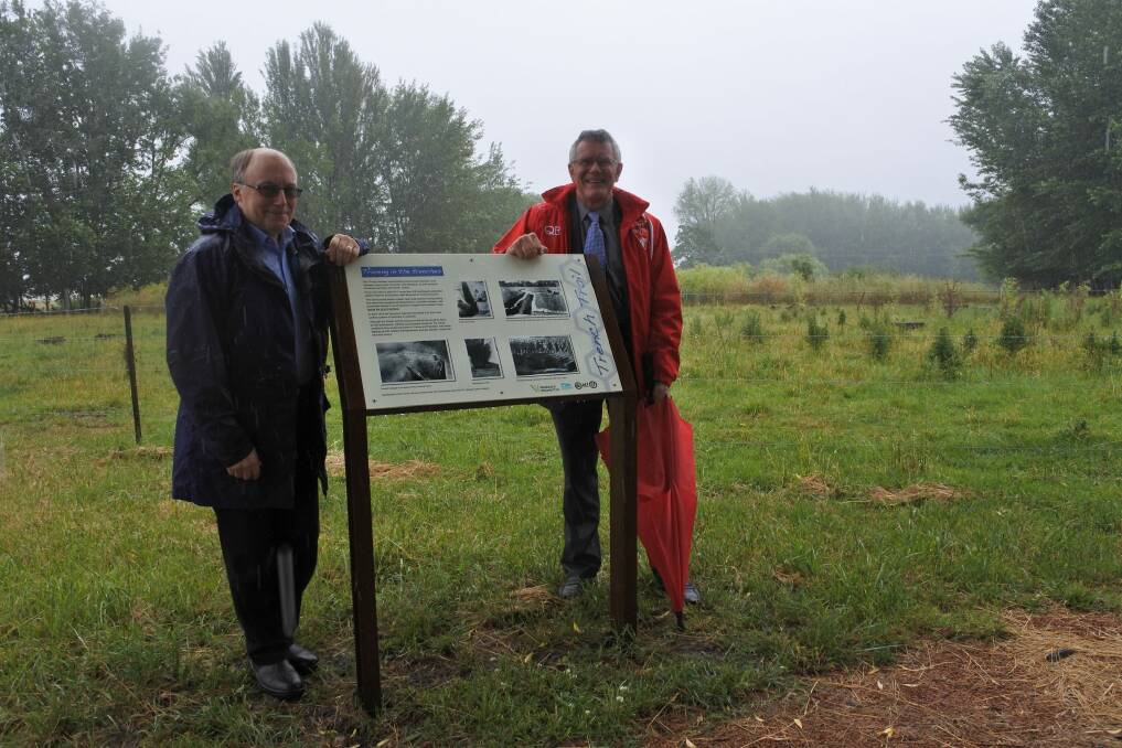 Historian Mark Butz and ACT Heritage Council chairman David Flannery at the launch of the Trench Trail at the Jerrabomberra Wetlands. Photo: Emily Baker