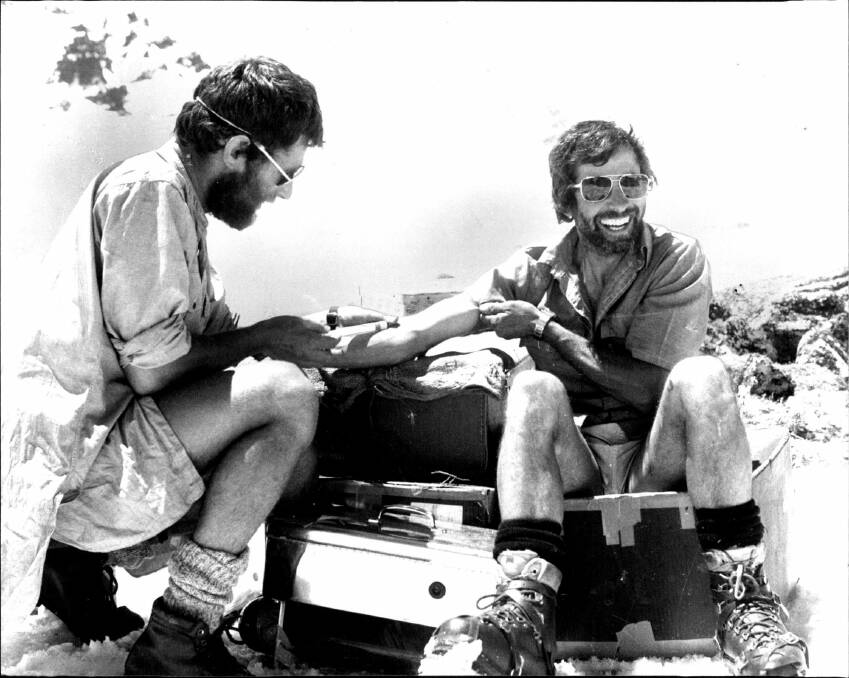  Dr. Mark Podkolinski takes a blood sample from Peter Cocker as the ANU expedition to Dunagiri,was also a chance to study the impact of high altitudes on the body. Photo: Fairfax Media