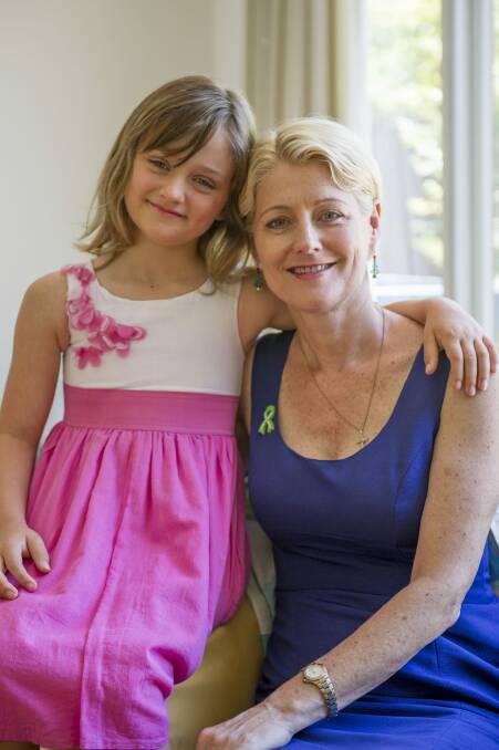 Marie Huttley-Jackson and daughter Genavieve, 8, who has been diagnosed with Lyme disease. Photo: Jay Cronan