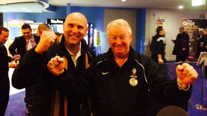 Tuggeranong United president Jon Thiele, left,  and coach Steve Forshaw react after hearing Friday's FFA Cup draw.