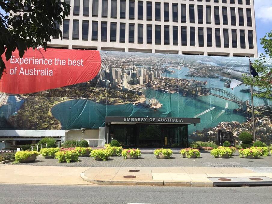 Qantas branding wrapped around the construction scaffolding on the crumbling Australian Embassy in Washington DC.