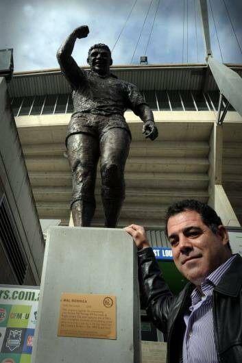 Mal Meninga with his statue at Canberra Stadium. Photo: Karleen Minney