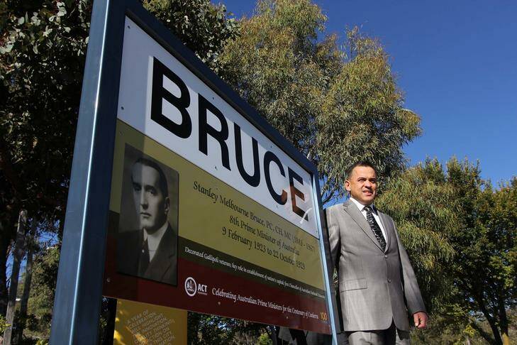Chris Bourke reveals the first of 16 new suburb signs created to honour of Australia's past Prime Ministers, after whom many of Canberra's suburbs are named. Photo: Supplied