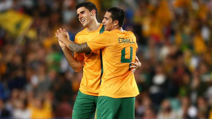 Tom Rogic and Tim Cahill have a celebratory hug after the Socceroos' win against Costa Rica. Photo: Getty Images