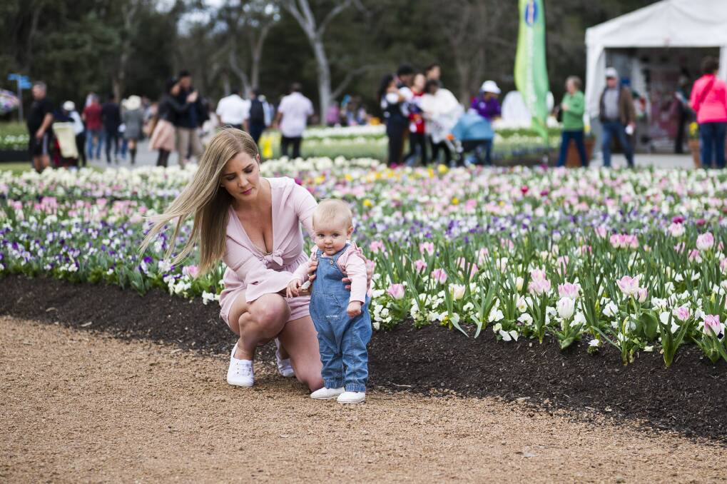 Floriade 2018.  Jess Kunkel and Lyla Corcoran 6 months at Floriade. Photo: Dion Georgopoulos