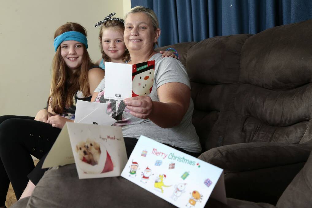 Michelle Mayer and her two daughters, Anna, 15, and Kelsie, 6, have benefited from Canberrans' generosity. Photo: Jeffrey Chan