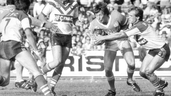 Craig Bellamy takes on the Canterbury defence at Seiffert Oval in 1984. The Raiders will return to their spiritual home next year. Photo: Peter Wells