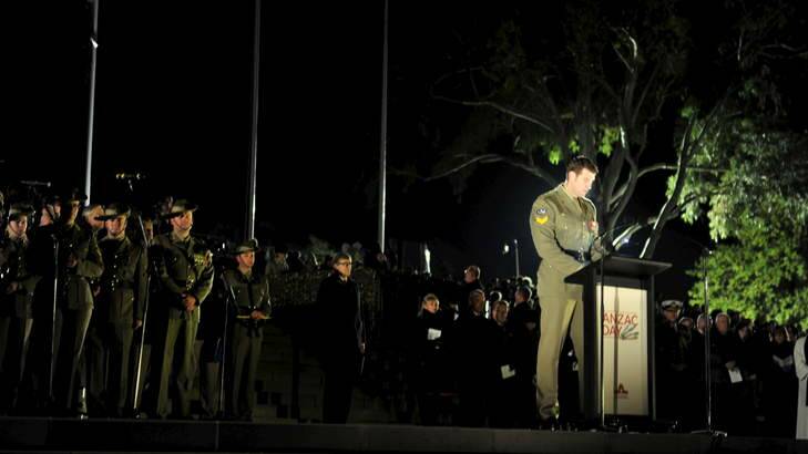 Victoria Cross recipient Corporal Ben Roberts-Smith, reading accounts from Australian soldiers, who have served in Afghanistan prior to the official start of the Dawn Service. Photo: Jay Cronan
