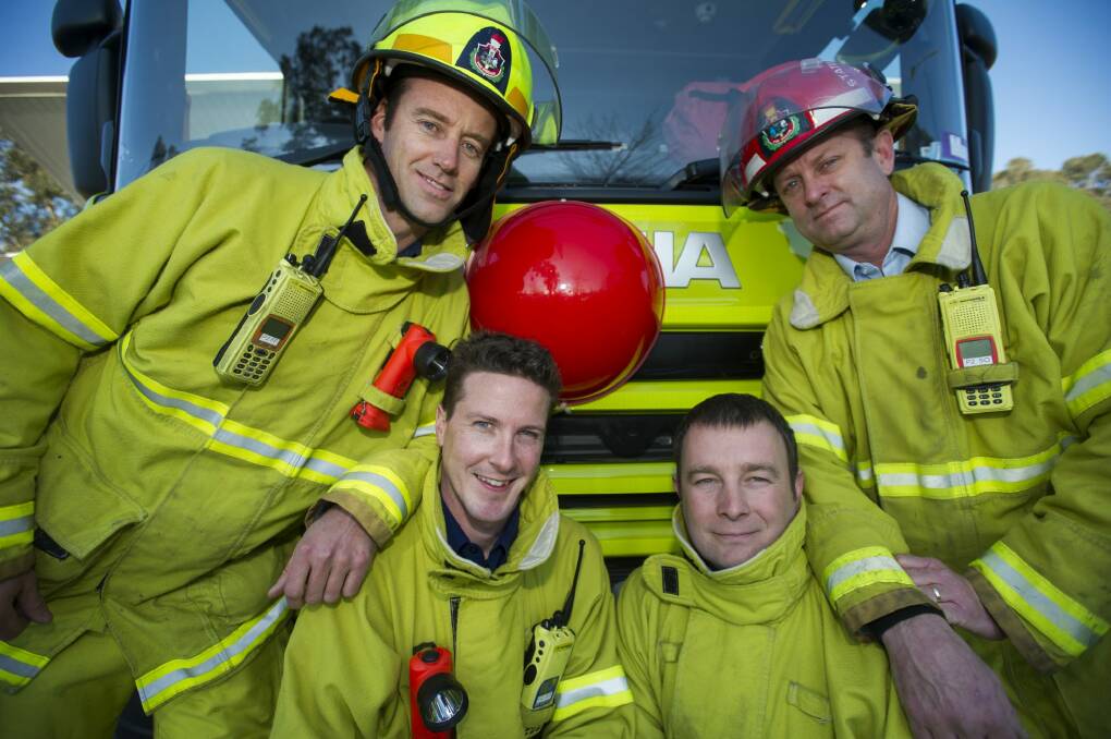 Firefighters of Ainslie Fire Station, Joe Howland, Lloyd O'Keeffe, Garry Curran and 
Station Officer Ben Sweetapple showing their support for SIDS Foundation. Photo: Jay Cronan