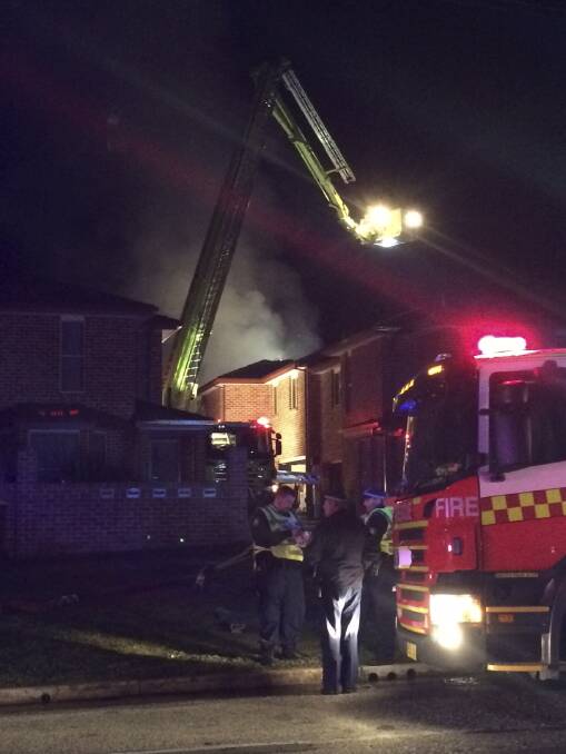 Firefighters at the scene of a blaze in Queanbeyan. Photo: Jamila Toderas
