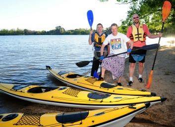 Kayaking mates, from left,  Steven Jeremy of Waramanga,  Jason Thornton of O'Connor and Richard Jones of Watson will  kayak around Lake Burley Griffin in a four-man, 24-hour for marathon to raise money for a Fijian infant primary school. Photo: Melissa Adams
