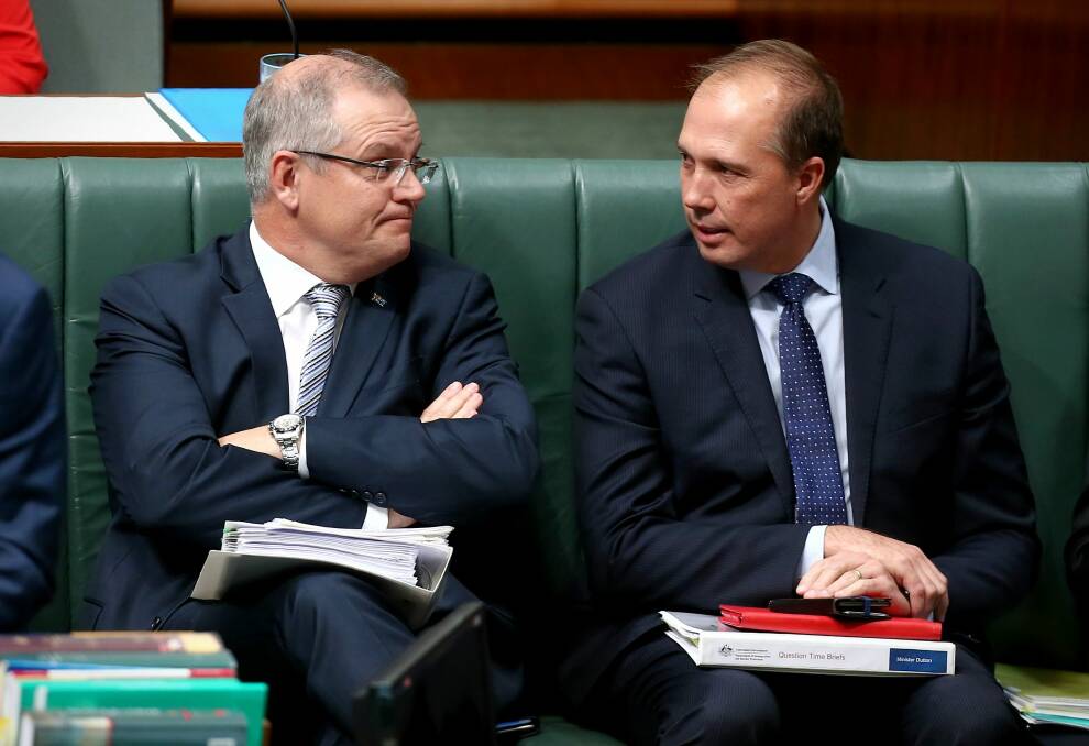 Treasurer Scott Morrison and Immigration Minister Peter Dutton have flagged a new battleground in the wake of same-sex marriage. Photo: Alex Ellinghausen