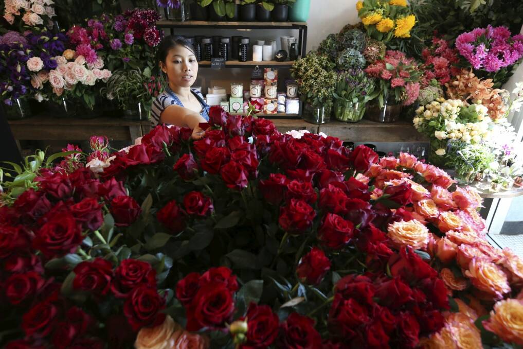 Poho Flowers in Potts Point has been flooded with orders for Valentine's Day on Sunday. Photo: Louise Kennerley