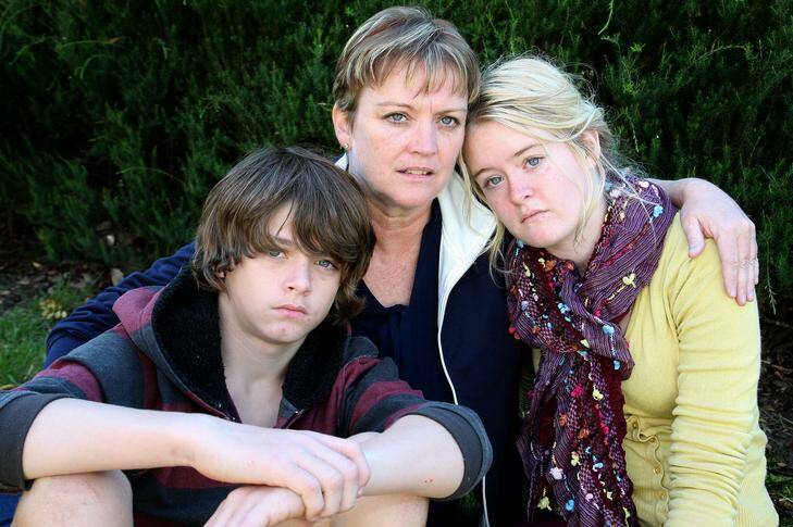 Fiona Vickery (centre) with son Jay Vickery and daughter Skye Vickery, her husband was killed at work last year. Photo: Jeffrey Chan