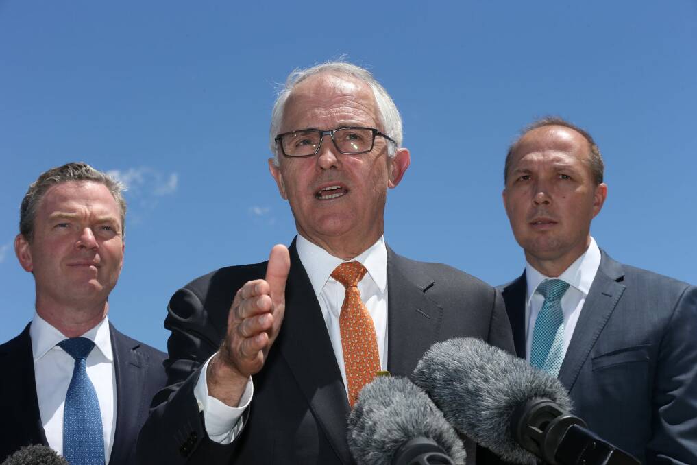 Ministers Christopher Pyne and Peter Dutton have backed Prime Minister Malcolm Turnbull over proposals for first home buyers to raid super. Photo: Andrew Meares