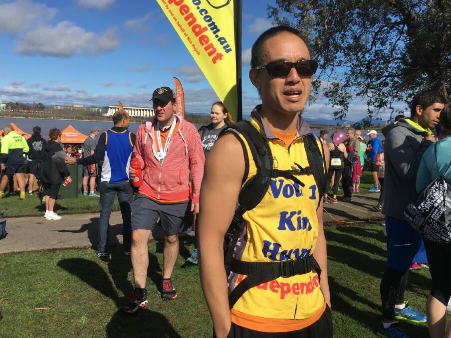 Kim Huynh, independent candidate in the ACT election 2016, at the end of the 10km Canberra Times Fun Run on Sunday. Photo: Kirsten Lawson