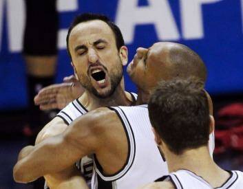 Winning: San Antonio Spurs' Manu Ginobili and Patty Mills celebrate a basket.
