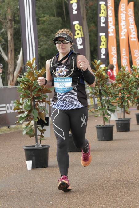 Erin Swain running her first marathon in Canberra in 2015 Photo: Marathon Photos