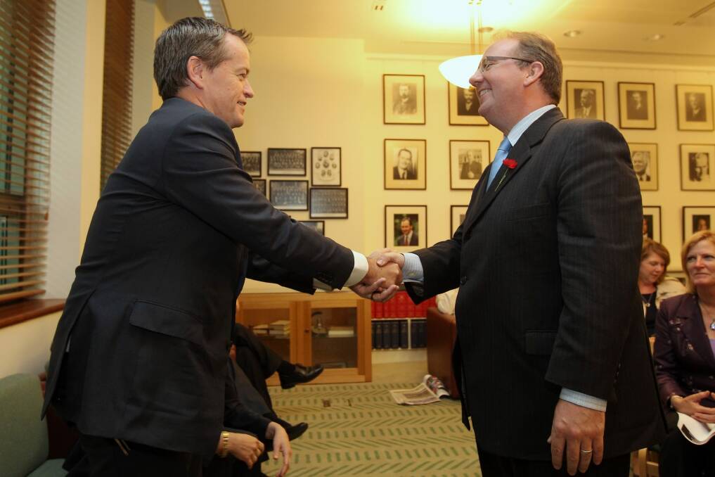 Happier times: Opposition Leader Bill Shorten congratulates David Feeney at the Labor caucus.   Photo: Alex Ellinghausen