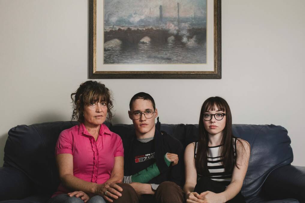Jocelyn Askew and her son Patrick, who had a brain bleed and was sent home by Calvary Hospital, and daughter Kelsey.  Photo: Jamila Toderas