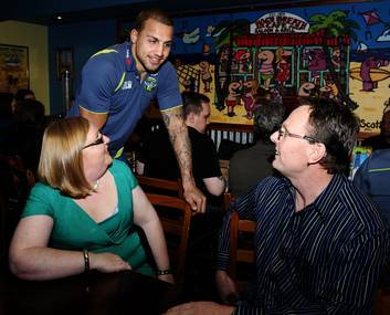Blake Ferguson chats with Raiders members, Michelle and Mark Graham of Gordon. Photo: Melissa Adams