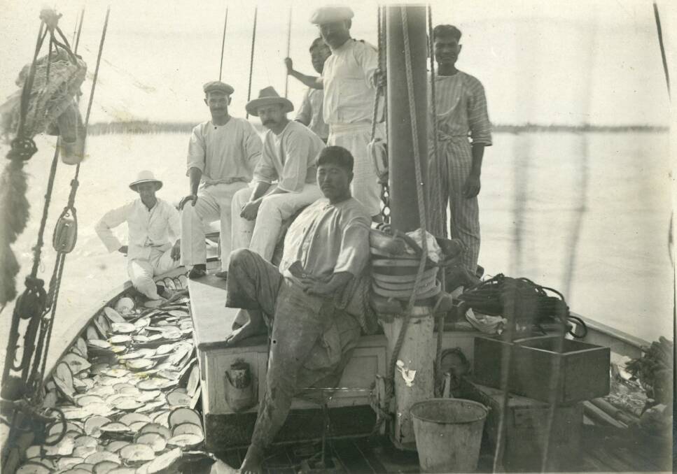 Pearlers onboard a traditional wooden lugger. Photo: Courtesy of the National Archives of Australia