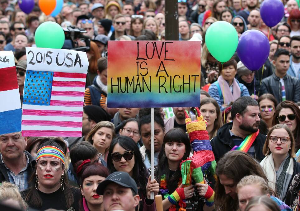 Supporters join in the marriage equality rally in Melbourne. Photo: AAP