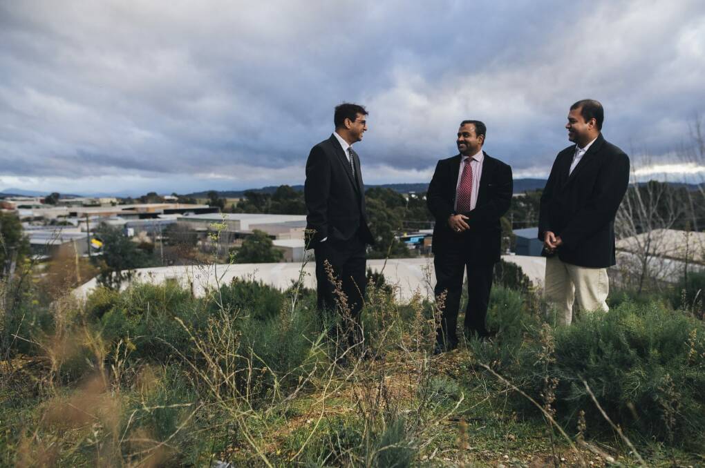 Members of the Islamic Forum for Australian Muslims, Sameer Alam, Gaffar Ghan and Siraj Mohammed at the site in Queanbyean which they have had approved for a mosque. Photo: Rohan Thomson