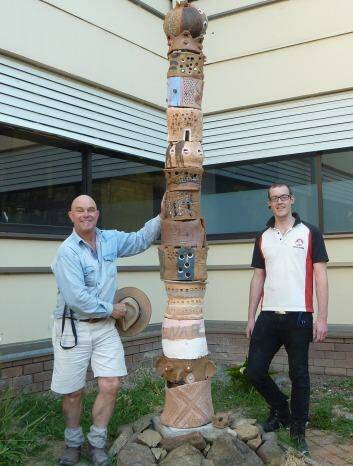 The Ceramic totem at Melrose High School 2014 has artist Tony Steel and Mark Holberton (pastoral care)  Photo: supplied