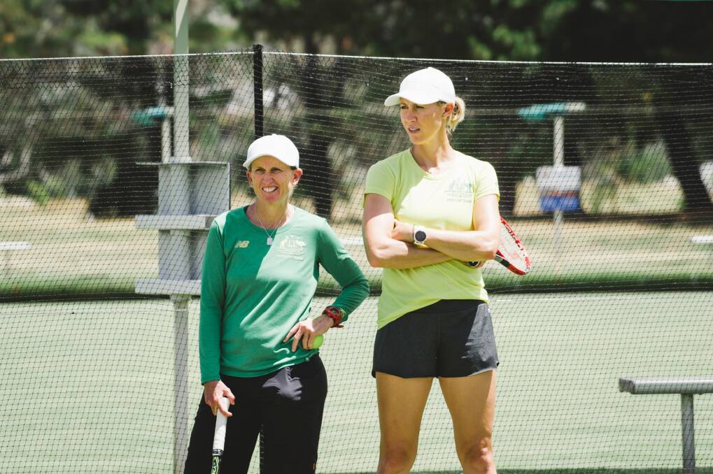 Fed Cup coach Nicole Pratt and captain Alicia Molik keep an eye on proceedings in Canberra on Monday. Photo: Jamila Toderas