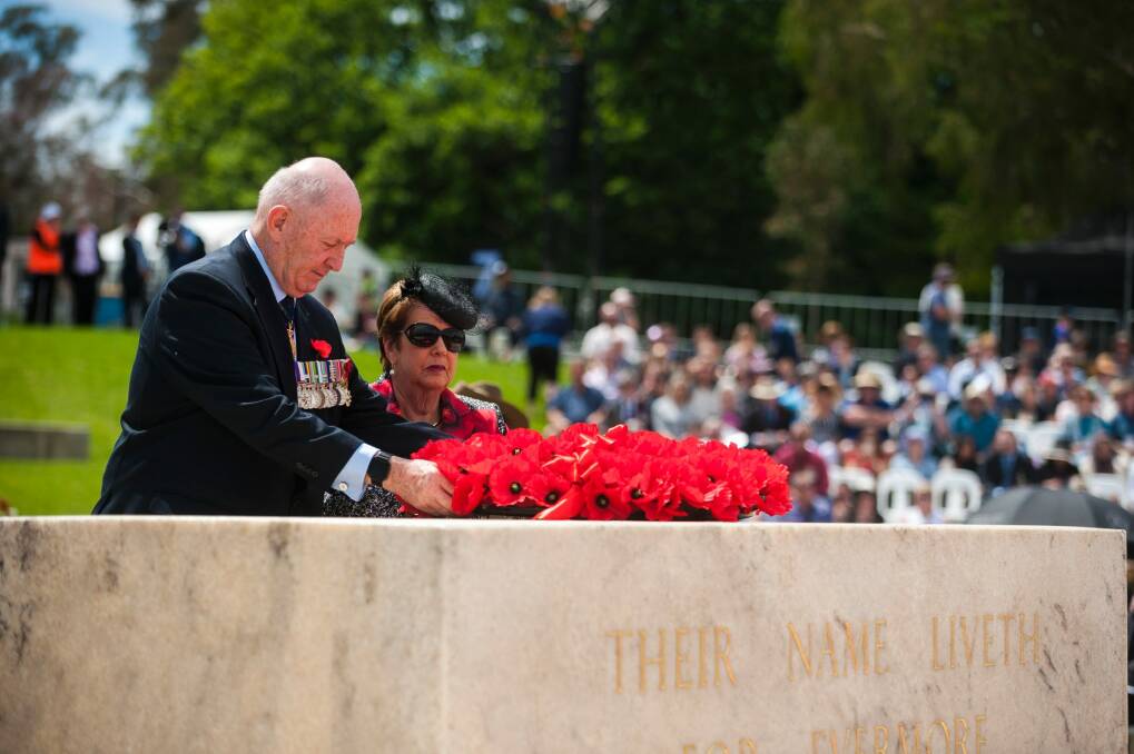 Governor-General Sir Peter Cosgrove lays a wreath on the Stone of Remembrance with his wife Lady Lynne Cosgrove. Photo: Dion Georgopoulos