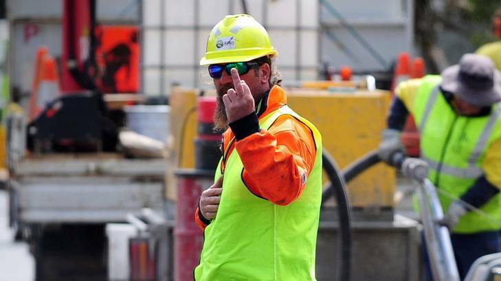 A worker at the Nishi building site expresses his displeasure at being photographed by The Canberra Times on Wednesday. Photo: Karleen Minney