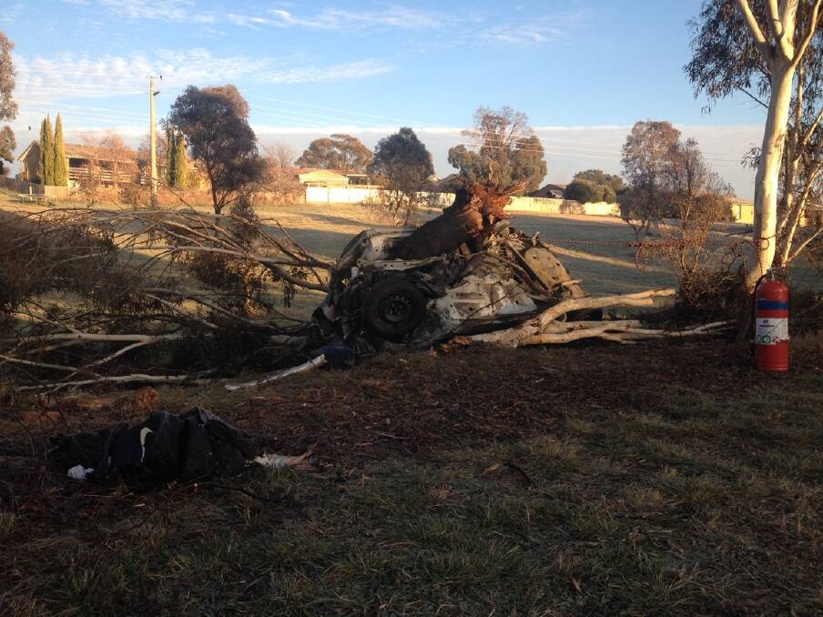The car crashed into a tree and caught fire, killing the driver. Photo: Emma Kelly