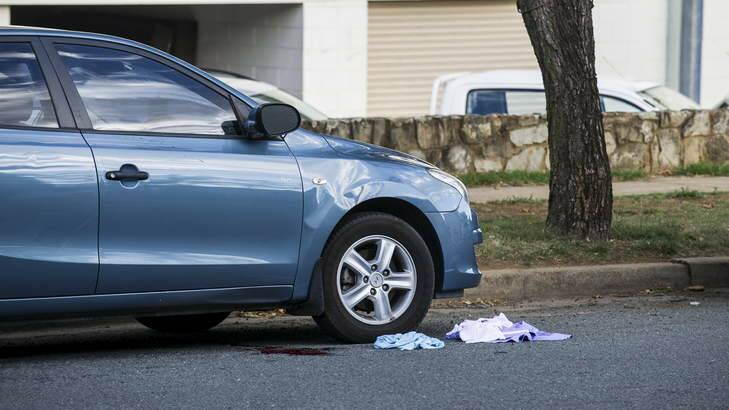 Blood and clothing at the scene of a serious hit and run on Henty Sreet in Braddon overnight. Photo: Rohan Thomson