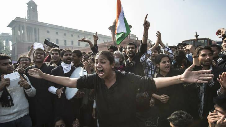 Anti-police slogans &#8230; protesters at the presidential palace in Delhi. Photo: Getty