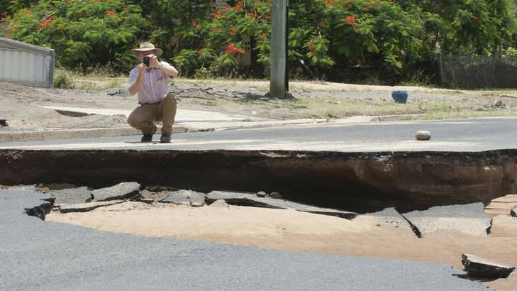 Campbell Newman takes a tour of the flood damage in North Bundaberg. Photo: Harrison Saragossi
